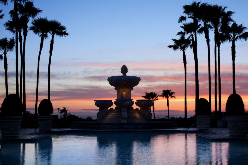 str1361po-134900-Main Pool Fountain at Sunset