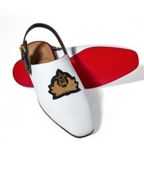 Men's babouche Louboutin slipper with Moroccan symbol.