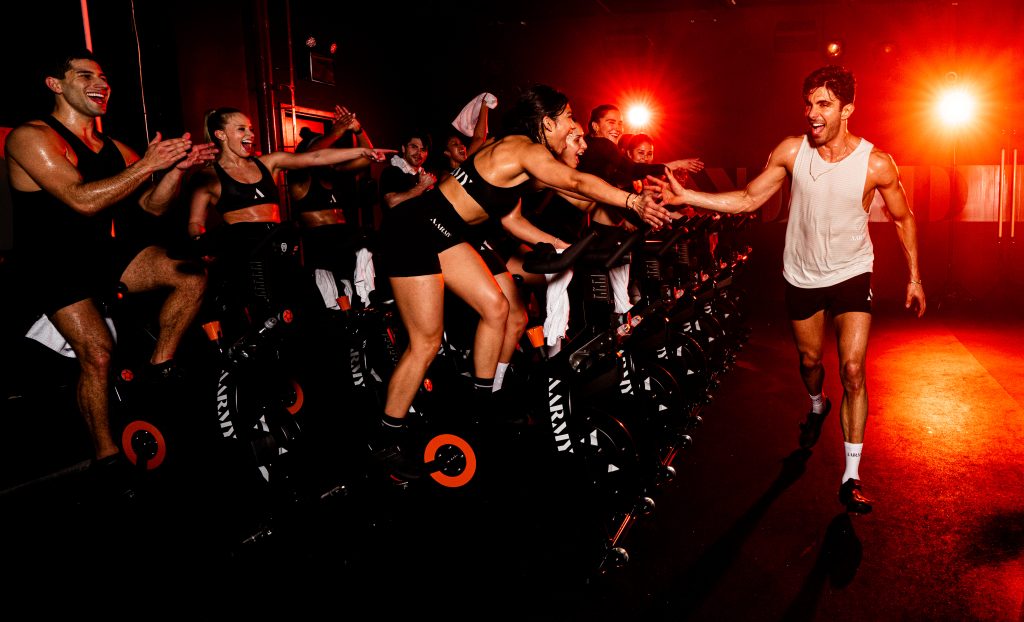 Akin Akman teaches an AARMY cycling class. Photo Credit: Jared Ryder